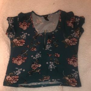 Size Large floral printed, “U” neck crop top.